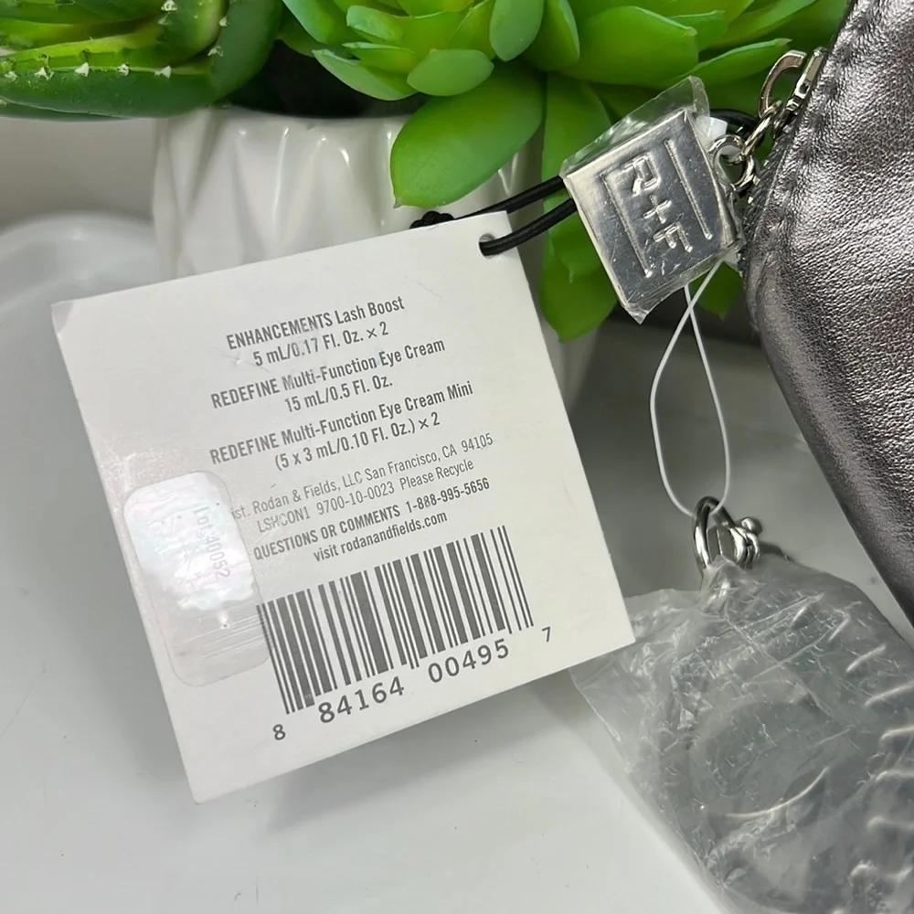 NWT Rodan + Fields Cosmetic Bag Silver with Tassel